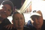From left to right, actor Woody Harrelson, Shane MacGowan, and musician Paul Simon